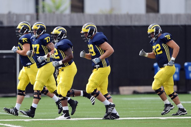Michigan football players move to a different section of the practice field during practice on Tuesday. Melanie Maxwell I AnnArbor.com